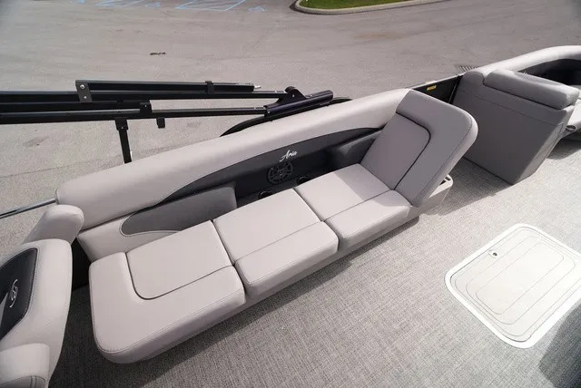 Slide: The Image of The image shows the sleek, gray seating of a 2025 Barletta Aria A22CC boat. - 24