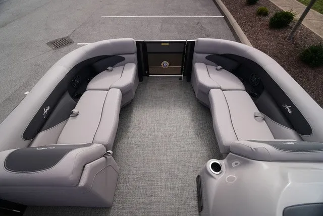Slide: The Image of The image shows the interior of a 2025 Barletta Aria A22CC with gray upholstery. - 36