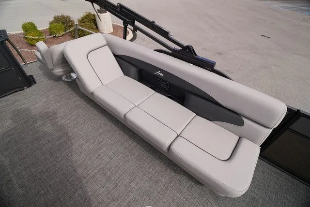 Slide: The Image of The image shows a gray bench seat on a boat with carpeted flooring. - 22