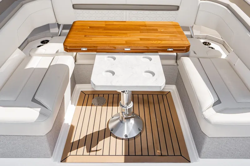 Slide: The Image of Luxurious seating area on 2023 Tiara Yachts 43 LS with wooden and marble tables. - 15