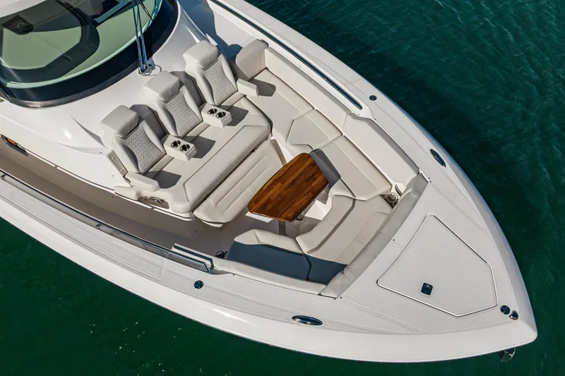 Slide: The Image of 2023 Tiara Yachts 43 LS luxury boat with spacious seating and elegant design. - 8