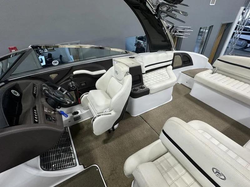 Slide: The Image of 2017 Cobalt R7WSS Surf boat interior with white leather seating and modern dashboard. - 11