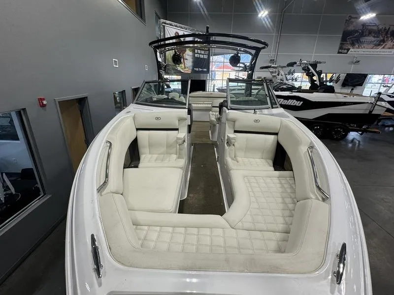 Slide: The Image of 2017 Cobalt R7WSS Surf boat with white interior in showroom. - 3