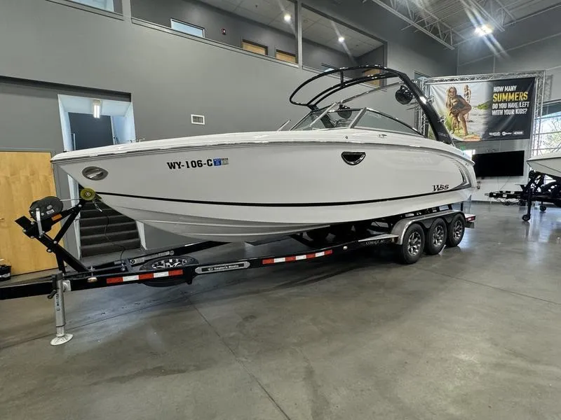Slide: The Image of 2017 Cobalt R7WSS Surf boat on trailer in showroom. - 4