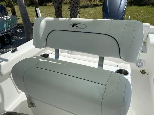 Slide: The Image of 2016 Sea Hunt Edge 24 boat seating with cup holders and logo. - 39