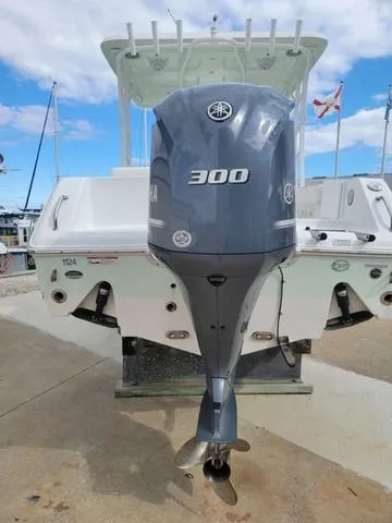 Slide: The Image of 2016 Sea Hunt Edge 24 with Yamaha 300 outboard motor at dock. - 4