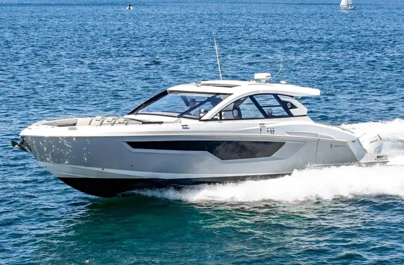 The Image of 2025 Cruisers Yachts 50 GLS cruising on open water. - 0