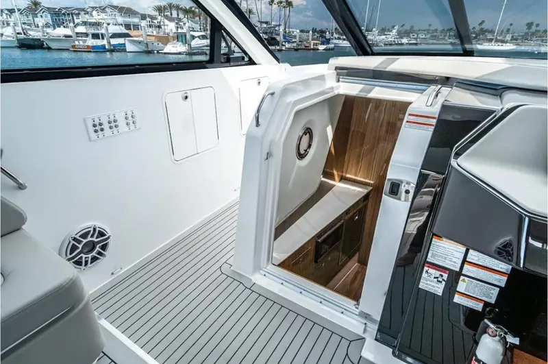 Slide: The Image of 2025 Cruisers Yachts 50 GLS interior cabin entrance with sleek design and modern features. - 28