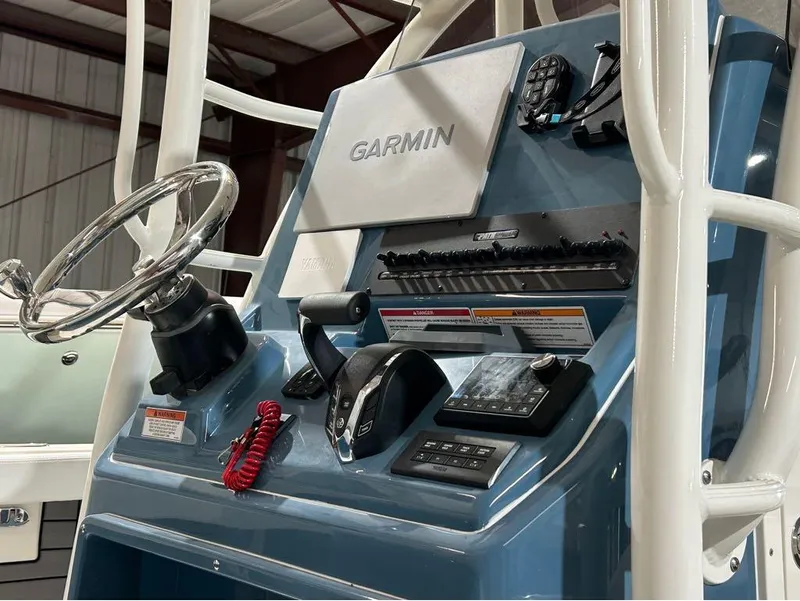 Slide: The Image of 2025 Pathfinder 2400 TRS boat console with Garmin navigation system. - 9
