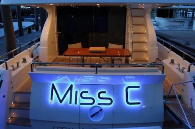 Slide: The Image of Luxury 2009 Uniesse 65 MY yacht, "Miss C," with elegant deck seating. - 3