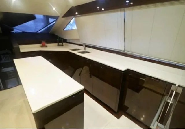 Slide: The Image of Luxurious kitchen interior of 2009 Uniesse 65 MY yacht with sleek countertops. - 9