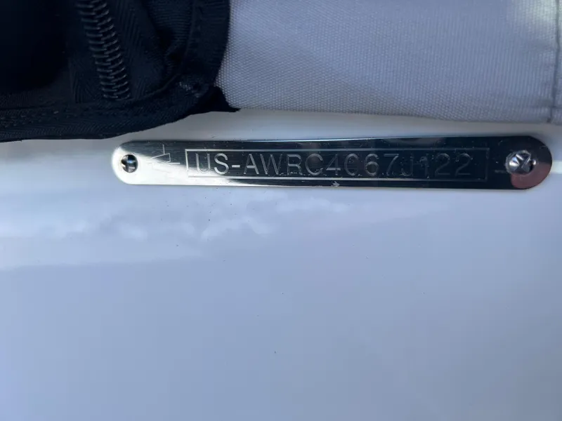 Slide: The Image of 2022 Axis Wake Research A24 boat identification plate with serial number. - 25