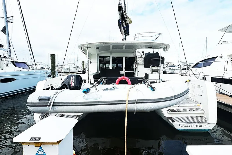 Slide: The Image of 2019 Lagoon 40 catamaran docked at Flagler Beach, FL marina. - 1