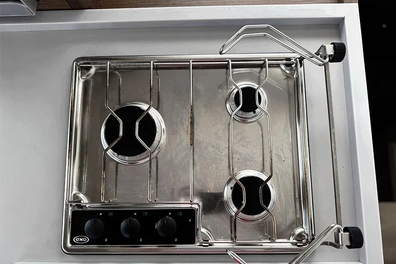 Slide: The Image of Stainless steel three-burner stove on a 2019 Lagoon 40 yacht. - 15