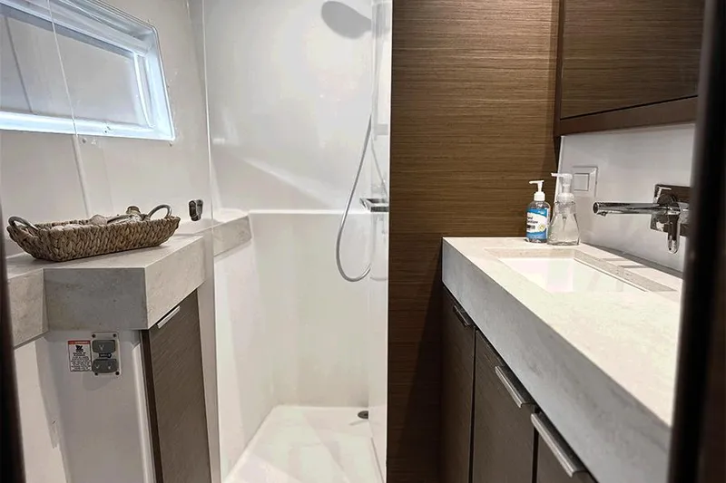 Slide: The Image of Modern bathroom in 2019 Lagoon 40 yacht with shower and sink. - 23