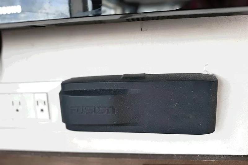 Slide: The Image of Black device mounted on a wall near electrical outlets, Lagoon 40, 2019 model. - 8