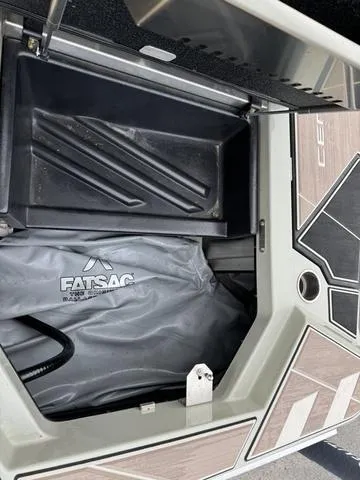 Slide: The Image of 2022 Centurion Ri245 boat storage compartment with FATSAC ballast bag. - 12