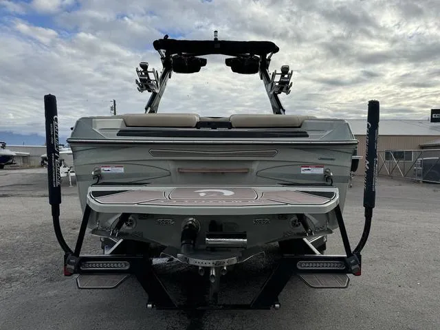 Slide: The Image of 2022 Centurion Ri245 boat rear view with wakeboard tower and swim platform. - 5