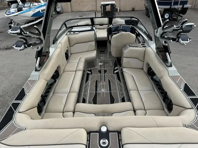 Slide: The Image of Luxurious interior of 2022 Centurion Ri245 boat with spacious seating and modern design. - 7