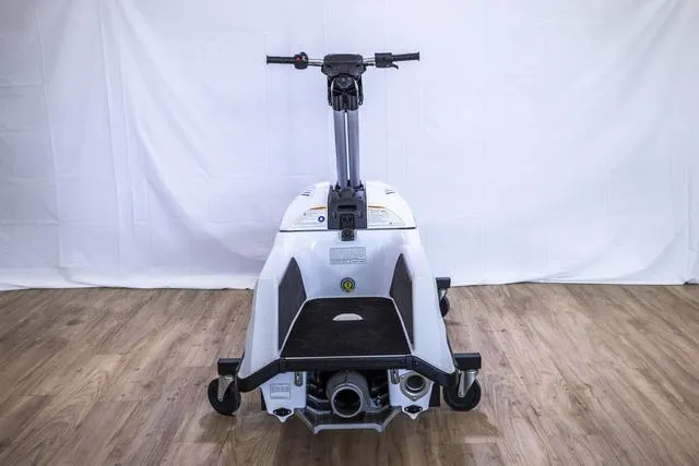 Slide: The Image of 2023 Yamaha Waverunner Superjet® on display, rear view, indoors on wooden floor. - 7