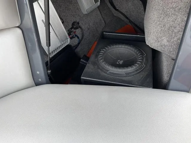 Slide: The Image of 2016 Malibu 22 VLX interior with audio system and subwoofer. - 15