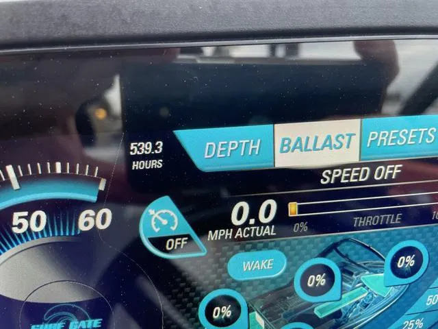 Slide: The Image of Dashboard of a 2016 Malibu 22 VLX boat showing 539.3 hours and speed settings. - 21