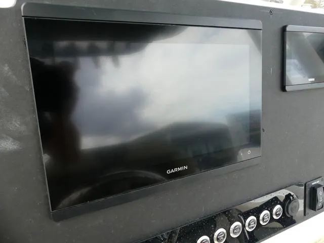 Slide: The Image of Garmin display on 2025 Key West 244 CC boat dashboard. - 19