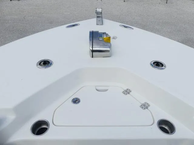 Slide: The Image of Bow of 2025 Key West 244 CC boat with anchor and storage hatch. - 24