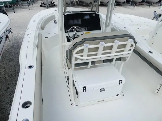 Slide: The Image of 2025 Key West 244 CC boat interior with console and seating. - 8