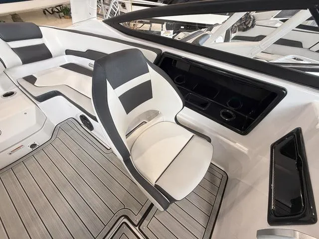 Slide: The Image of Interior of 2025 Yamaha Boats 195S with stylish seating design. - 13