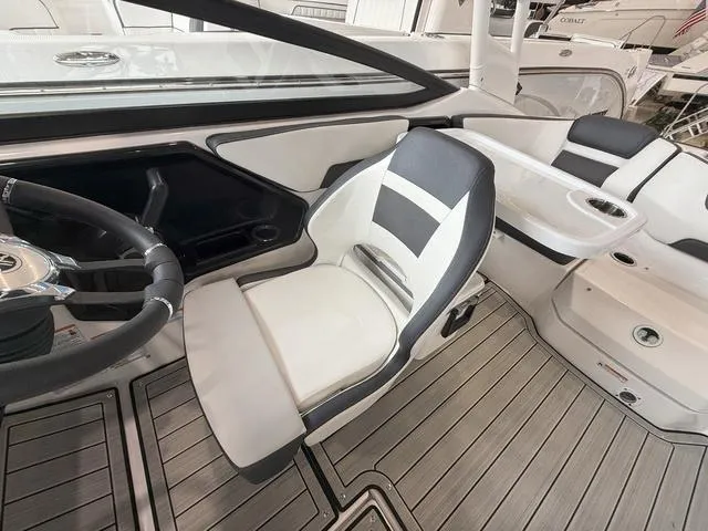 Slide: The Image of Interior of 2025 Yamaha Boats 195S with modern seating design. - 17