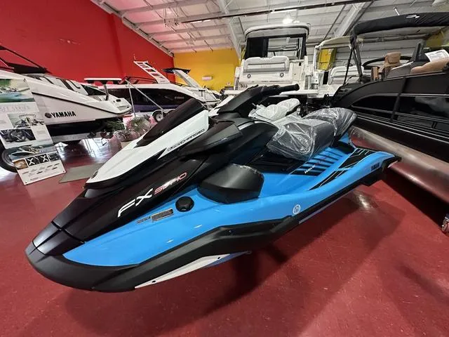 Slide: The Image of 2025 Yamaha WaveRunner FX SVHO in showroom, sleek blue and black design. - 1