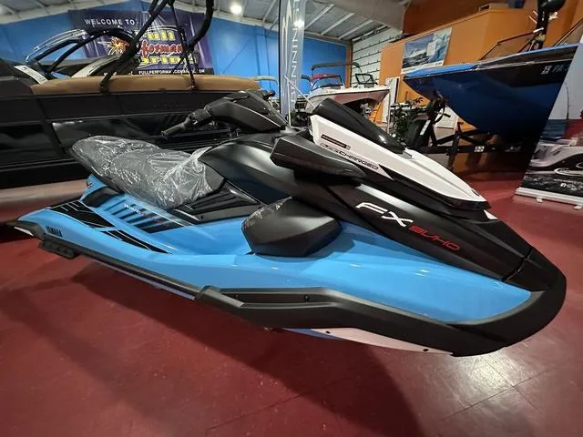 Slide: The Image of 2025 Yamaha WaveRunner FX SVHO in showroom, blue and black design. - 4