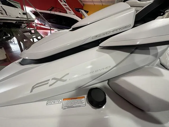 Slide: The Image of 2025 Yamaha WaveRunner FX Cruiser SVHO, supercharged, sleek design in showroom. - 3