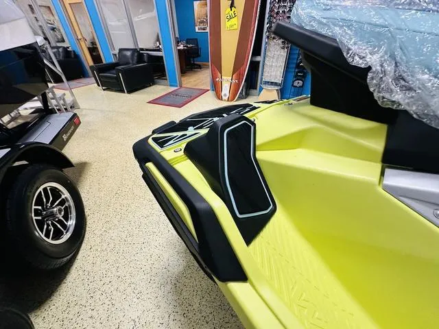 Slide: The Image of 2025 Yamaha WaveRunner JetBlaster in showroom, featuring vibrant yellow design and sleek details. - 6