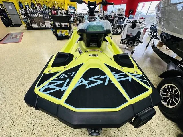 Slide: The Image of 2025 Yamaha WaveRunner JetBlaster in showroom, vibrant yellow design. - 7