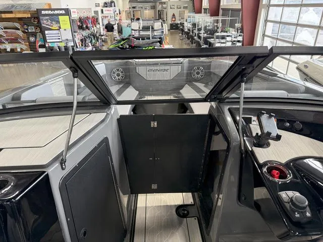 Slide: The Image of Interior view of 2025 Yamaha Boats 222XE, showcasing sleek design and modern controls. - 20