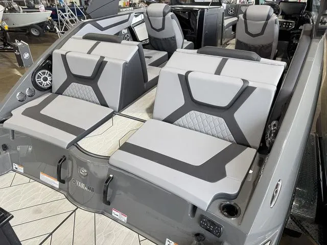 Slide: The Image of 2025 Yamaha Boats 222XE interior with modern seating and sleek design. - 5