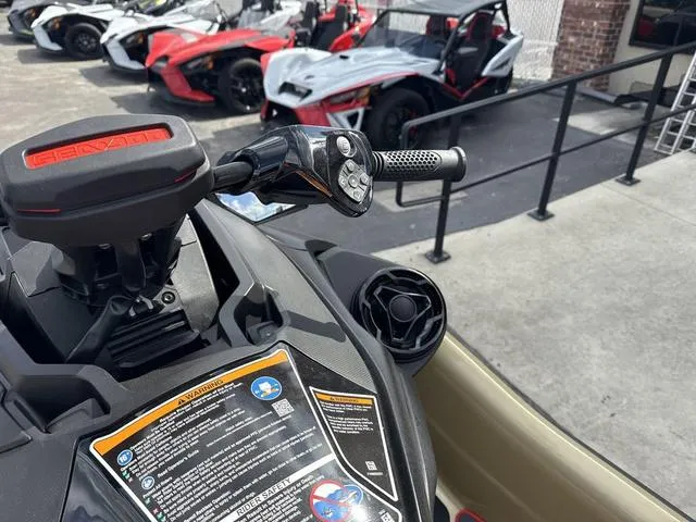 Slide: The Image of 2025 Sea-Doo Waverunner PWC RXT X 325, close-up of handlebars and controls. - 7