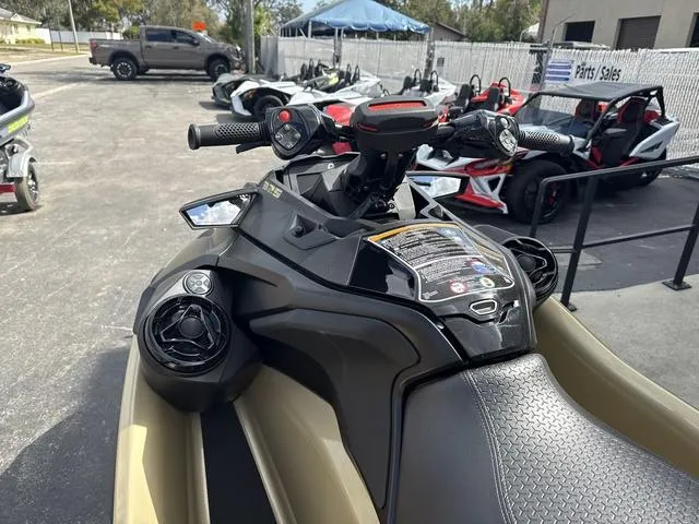 Slide: The Image of 2025 Sea-Doo Waverunner PWC RXT X 325, parked in dealership lot. - 6