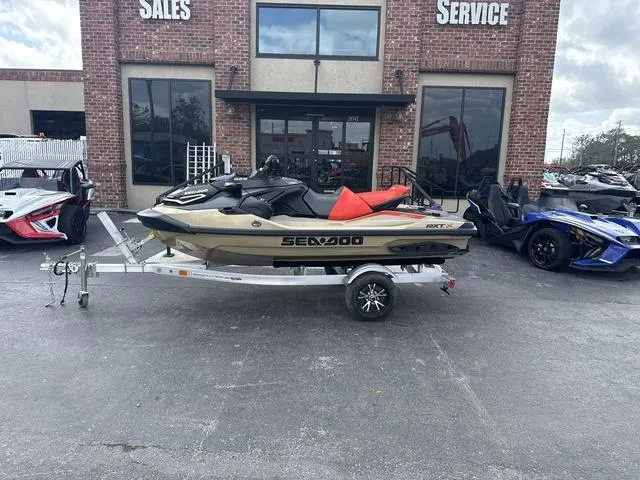 Slide: The Image of Sea-Doo RXT-X™ 325 Metallic Tan / Lava Red Premium 2025 - 1