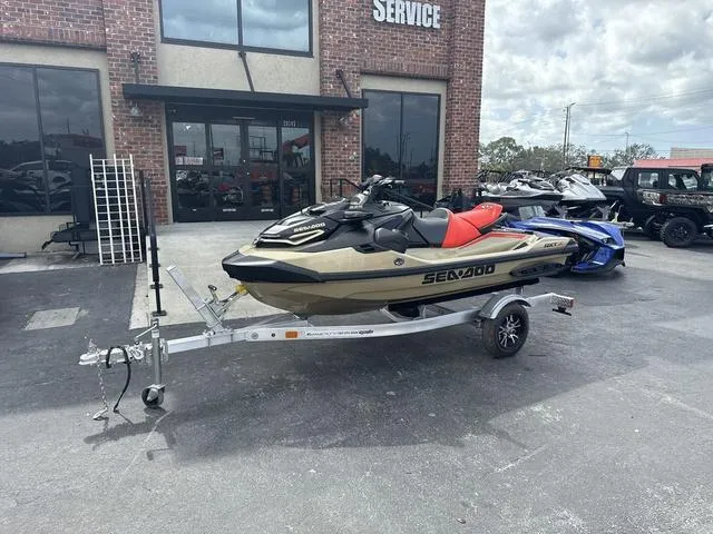 Slide: The Image of Sea-Doo RXT-X™ 325 Metallic Tan / Lava Red Premium 2025 - 2