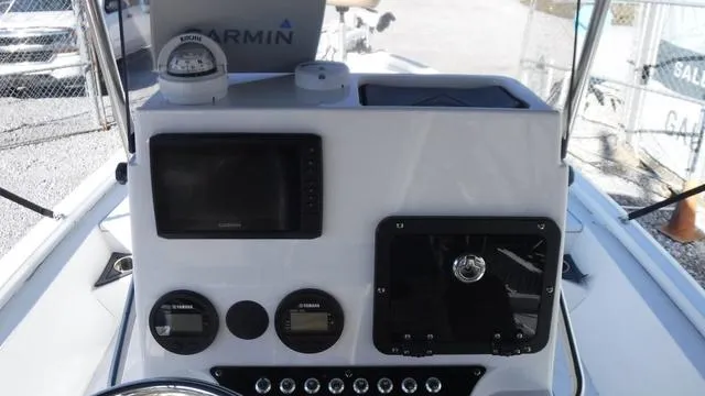 Slide: The Image of Avid 23 FS 2021 boat dashboard with Garmin navigation system and controls. - 10