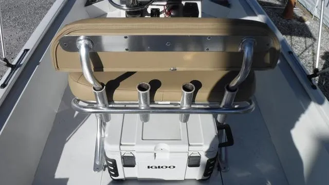 Slide: The Image of Avid 23 FS 2021 boat interior with Igloo cooler and rod holders. - 13