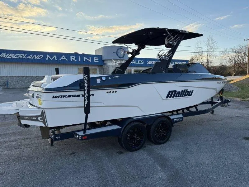 Slide: The Image of 2021 Malibu 25 LSV boat on trailer at Cumberland Marine dealership. - 18