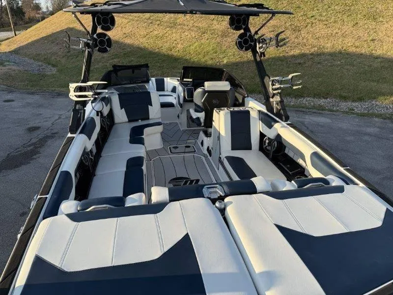 Slide: The Image of 2021 Malibu 25 LSV boat interior with spacious seating and modern design. - 40