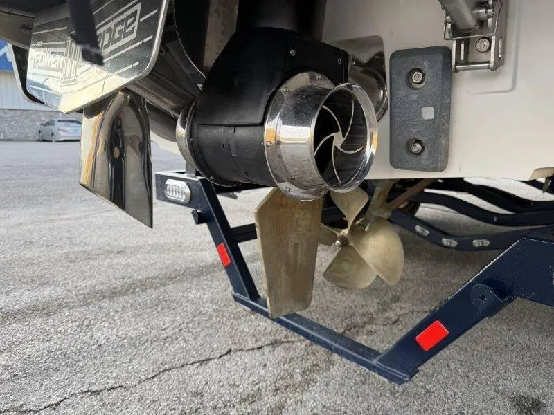 Slide: The Image of Close-up of 2021 Malibu 25 LSV boat propeller and exhaust system. - 42