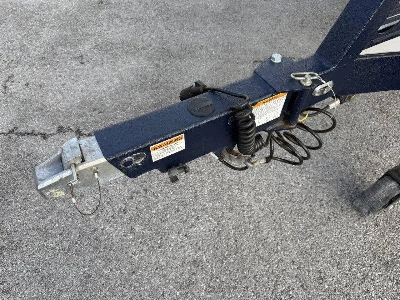 Slide: The Image of Trailer hitch of 2021 Malibu 25 LSV on asphalt surface. - 43