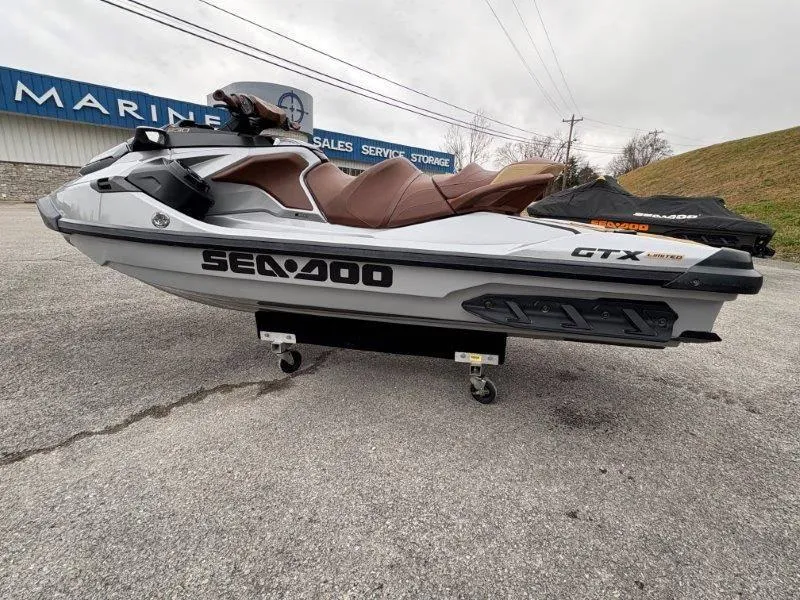 Slide: The Image of 2018 Sea-Doo GTX Limited 230 Sound jet ski on display outdoors. - 10