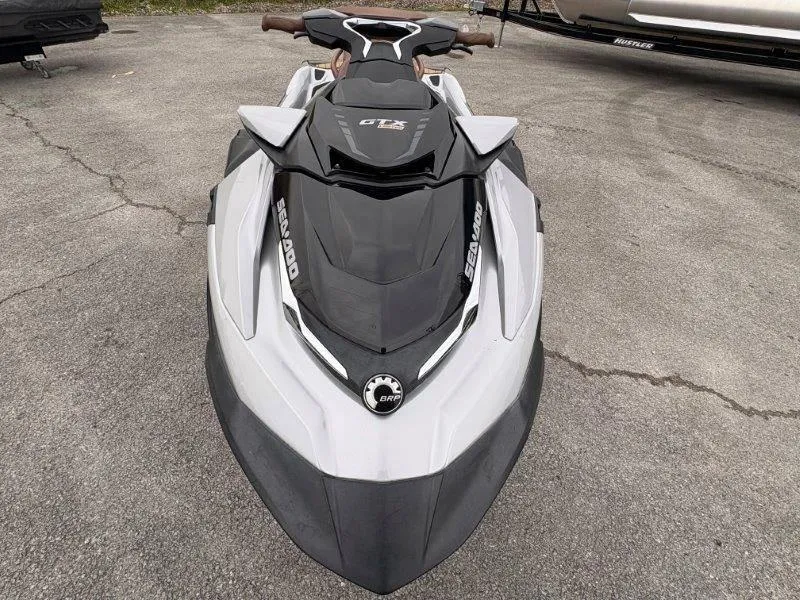 Slide: The Image of 2018 Sea-Doo GTX Limited 230 Sound jet ski on pavement. - 13